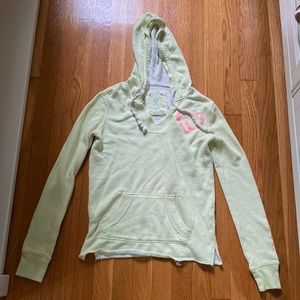 Neon yellow/green with hot pink writing brand is live love dream